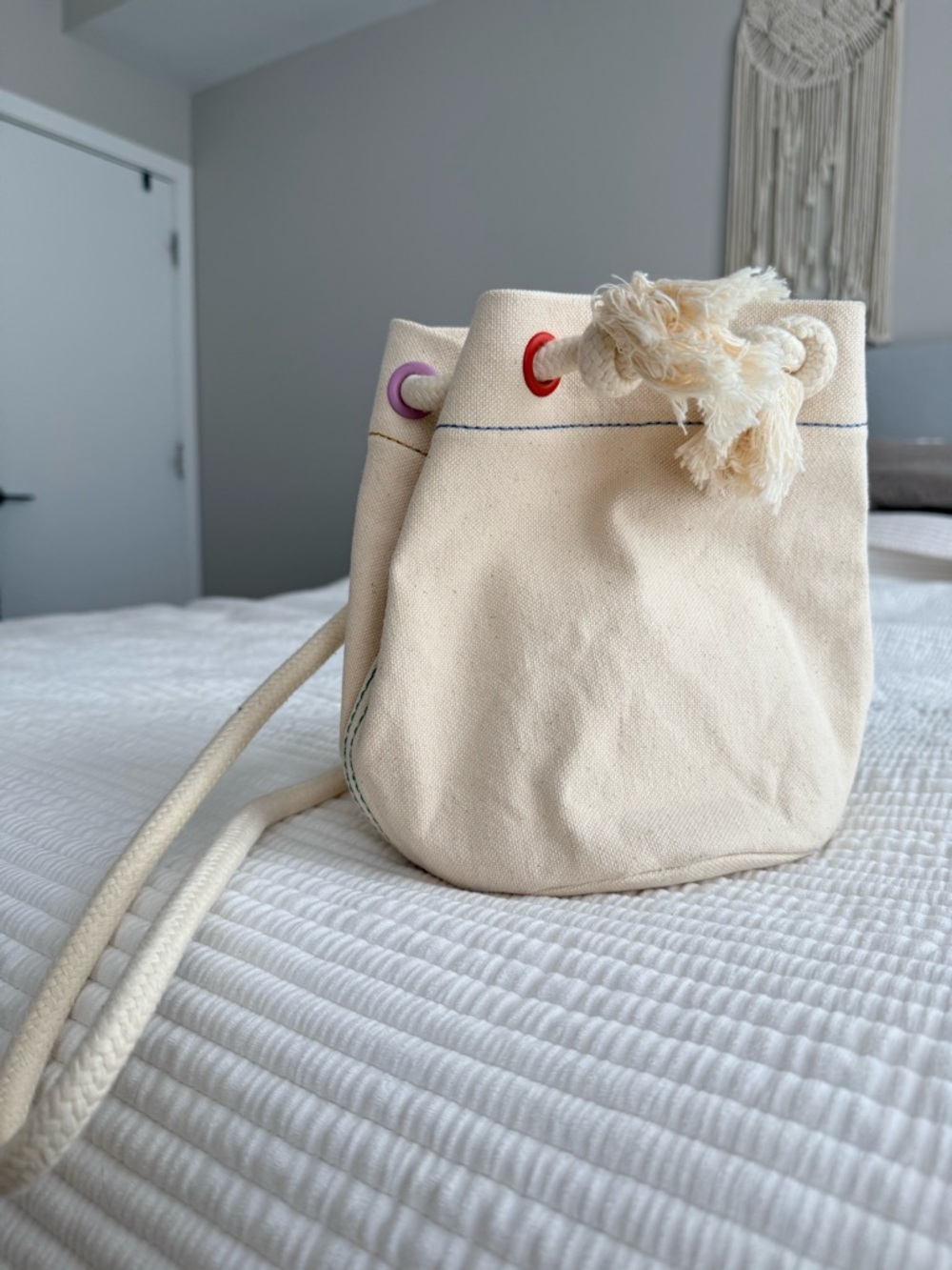 Madewell Cream Canvas Drawstring Crossbody with Red & Purple Eyelets